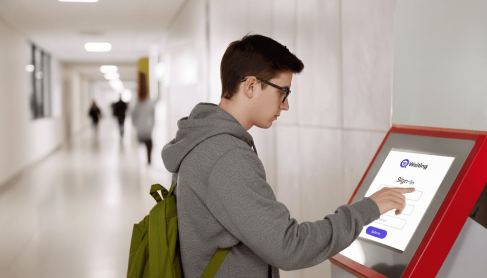 student using qwaiting&rsquo;s self-service kiosk